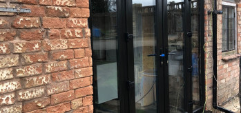 [Case Study) - Black Elegance French Door with Side Panels