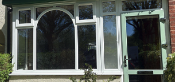 [Case Study) - White uPVC Elegance Casement Window and Chartwell Green Door