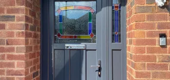 [Case Study) - Bespoke Anthracite Grey Front Door with unique glass design