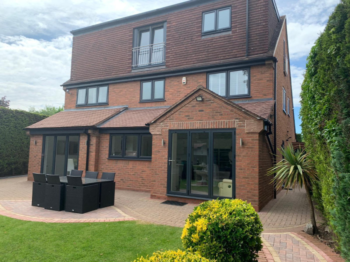 Finesse_Whole_House_Grey_Windows_Palladio_Patio_Doors_May5_2021-1