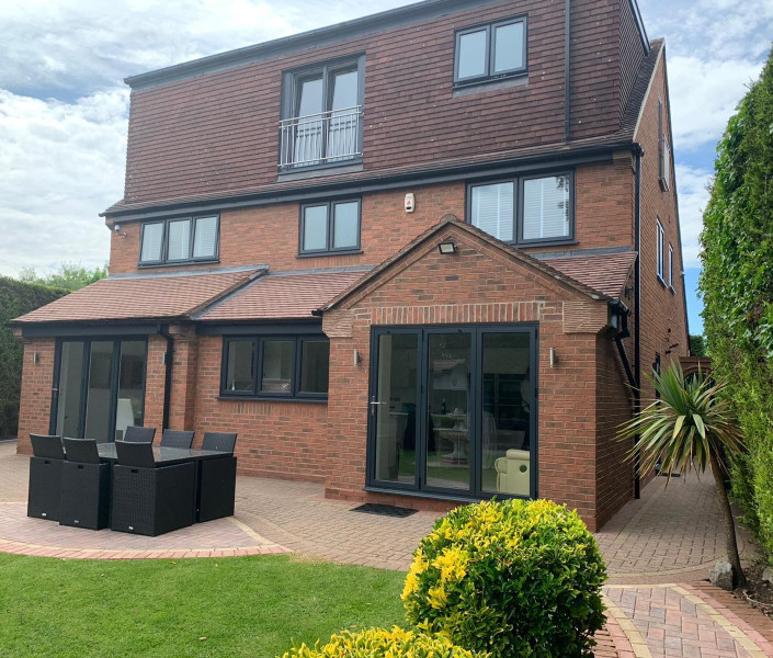 Finesse_Whole_House_Grey_Windows_Palladio_Patio_Doors_May5_2021