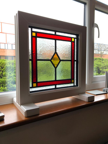 Encapsulating Original Stained Glass in new Tripled Glazed Units